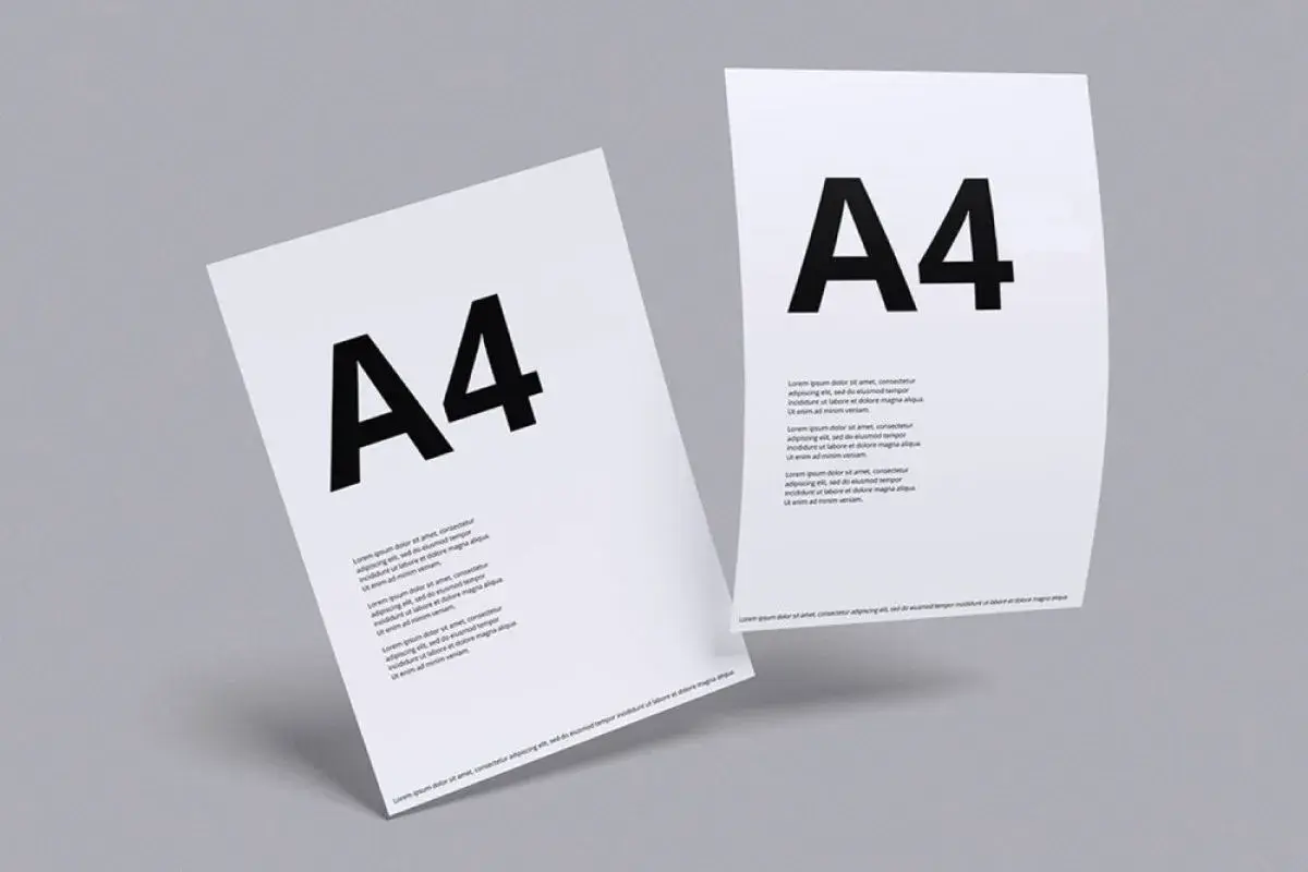 Dwa białe arkusze papieru w formacie **a4** z dużym czarnym napisem "A4" i tekstem.